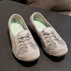 Grey/green skechers shoes
